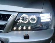 Кристални фарове за Mitsubishi Pajero (2001-2006) - черни
